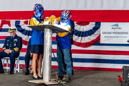 Dr. Meghan Seymour welds her initials into USCGC Pickering keel plate